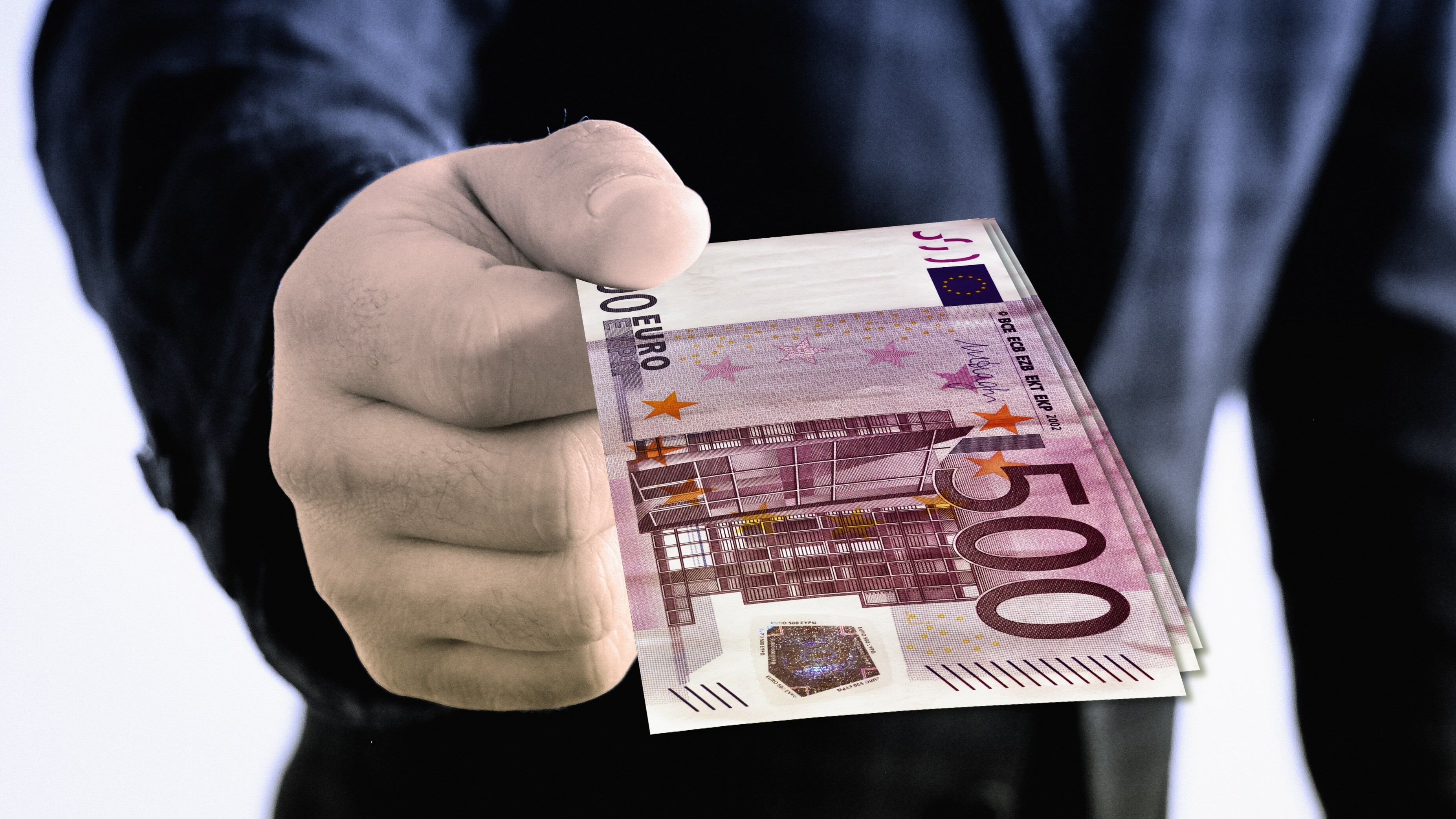Stockfoto Überreichung Gelschein 